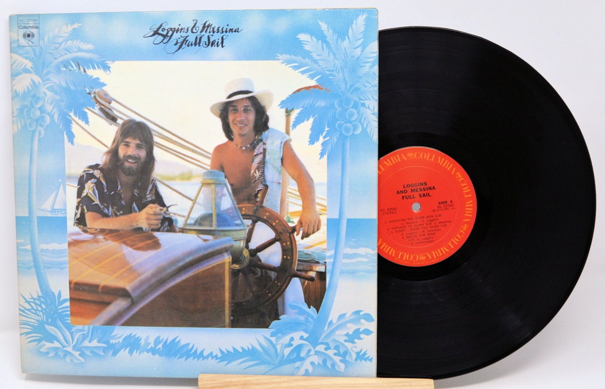 Vinyl record by Loggins & Messina titled Full Sail with front cover featuring two people on a boat, palm trees, and blue sky.