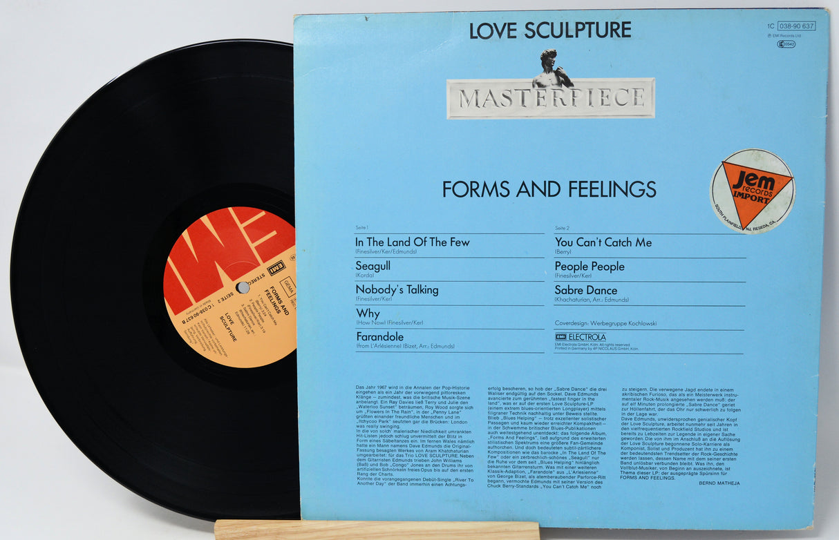 Vinyl record with blue cover featuring text and a logo on a white background