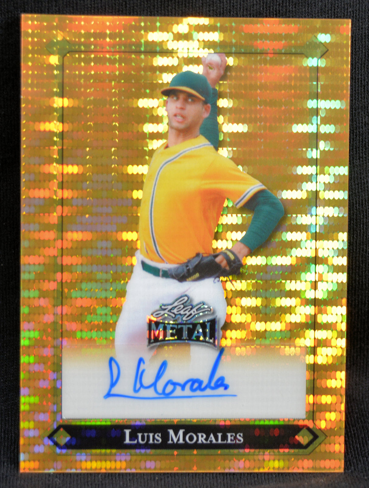 Baseball trading card of Luis Morales with metallic gold border and autograph. Leaf Metal numbered 1/1.