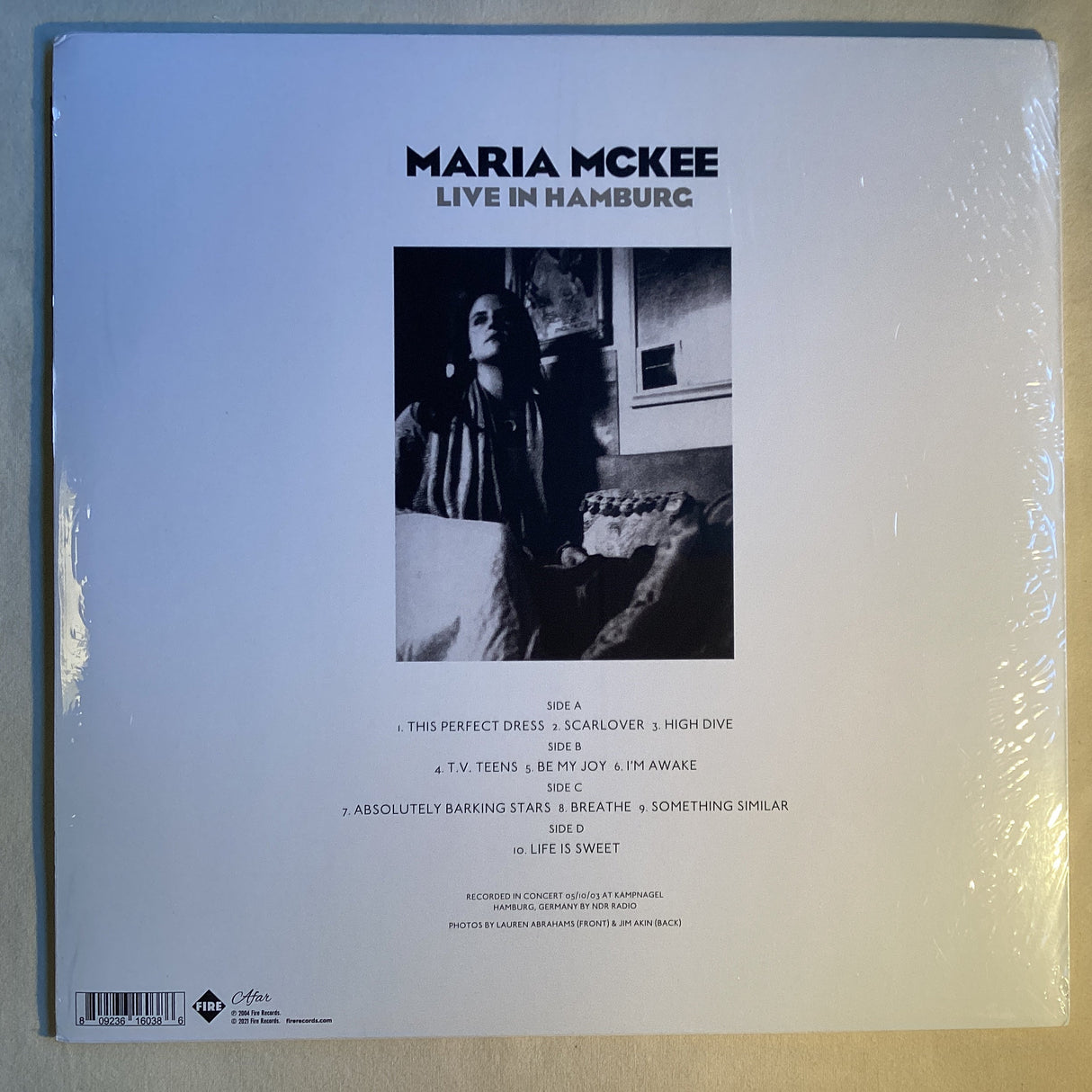 Back cover of Maria McKee Live in Hamburg vinyl with tracklist and artist photo
