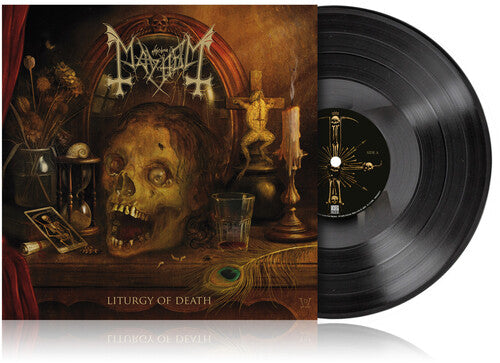 Vinyl record with 'Napalm Death' album cover featuring a skull and candles.