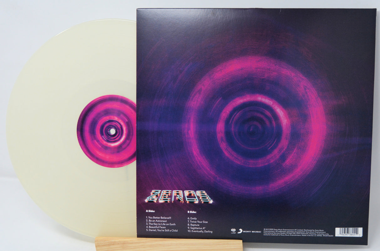 Vinyl record with a spiral design on the cover