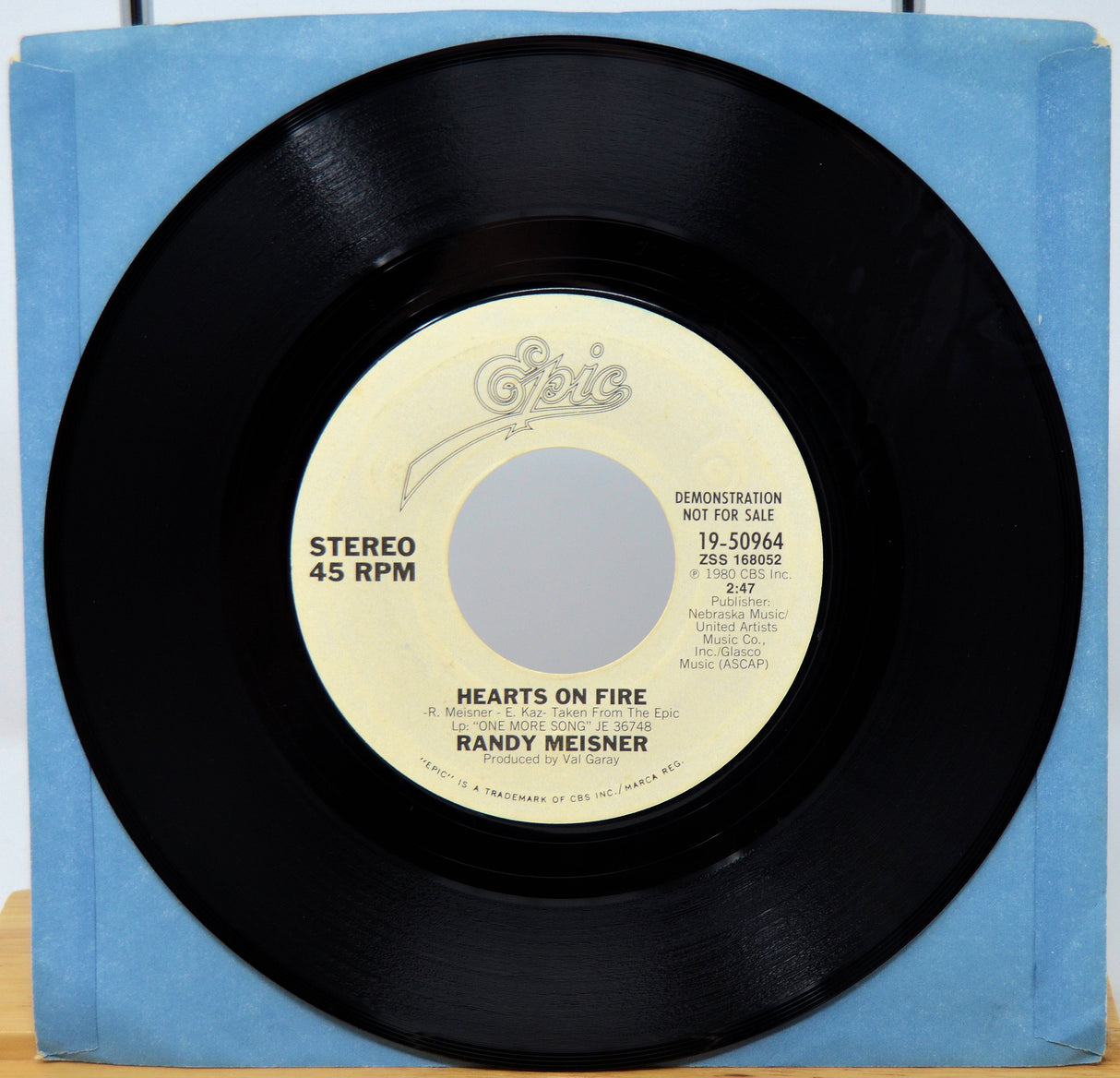 Vinyl record with a blue sleeve featuring the label 'Epic' and text.