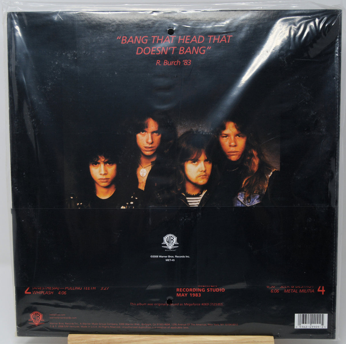 The back cover of a 1993 Warner Bros. Records vinyl record of R.