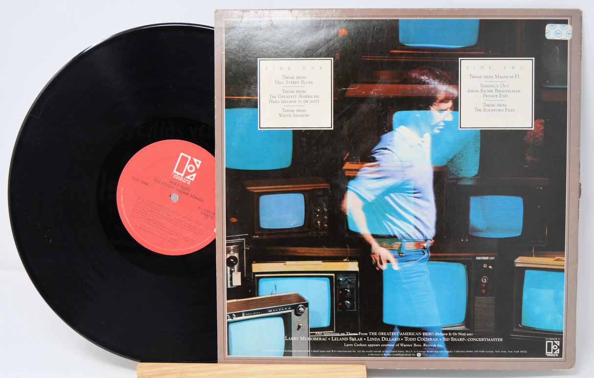 Back cover and record of Mike Post's Television Theme Songs vinyl LP featuring multiple TV screens