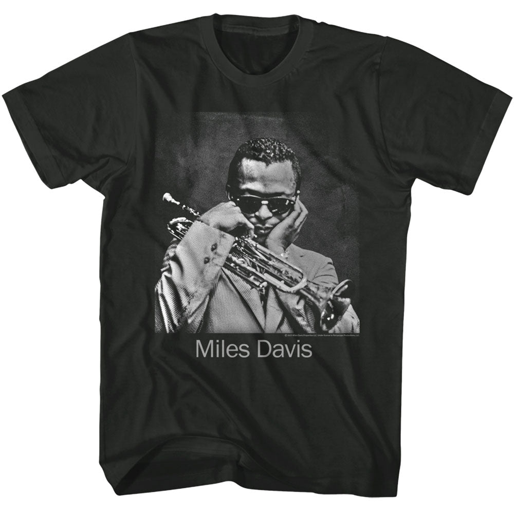 Black t-shirt with a graphic of Miles Davis playing trumpet on a white background