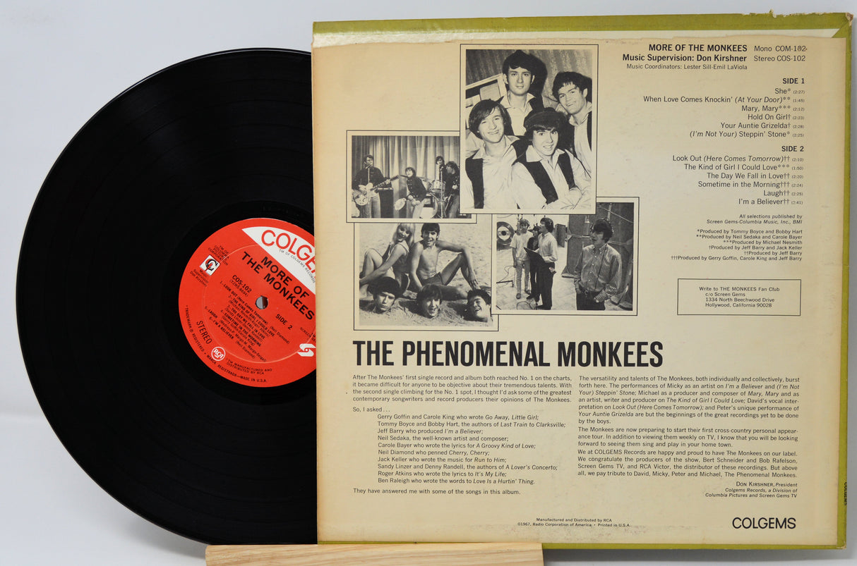 Vinyl record with 'The Phenomenal Monkees' cover on a light gray background