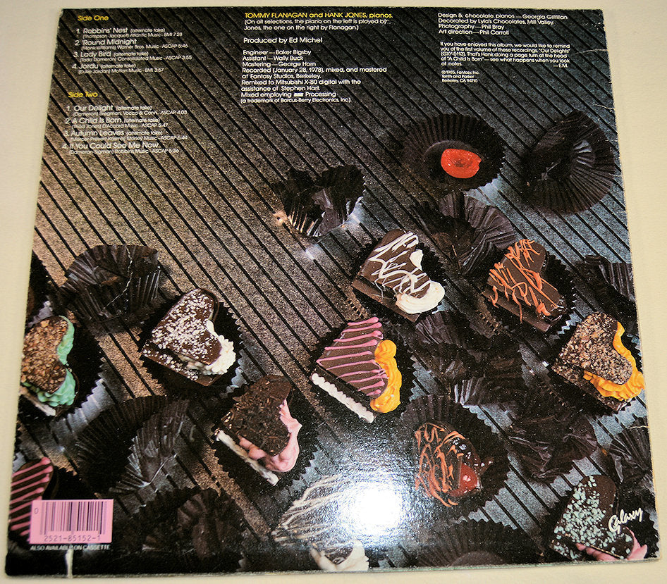 Back cover of More Delights album showing chocolates and song information