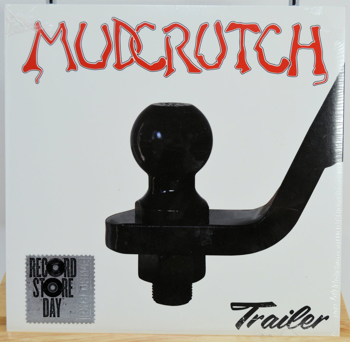 Front cover of Mudcrutch 'Trailer' Record Store Day vinyl featuring tow hitch artwork