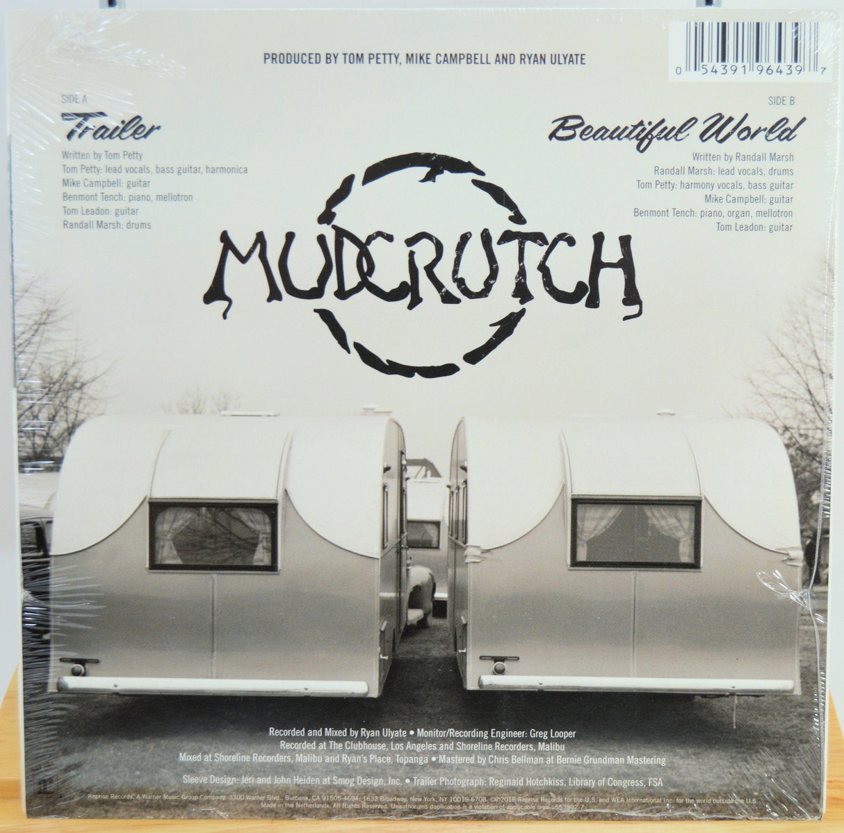 Back cover of Mudcrutch's 'Trailer' vinyl with twin vintage trailers and song credits