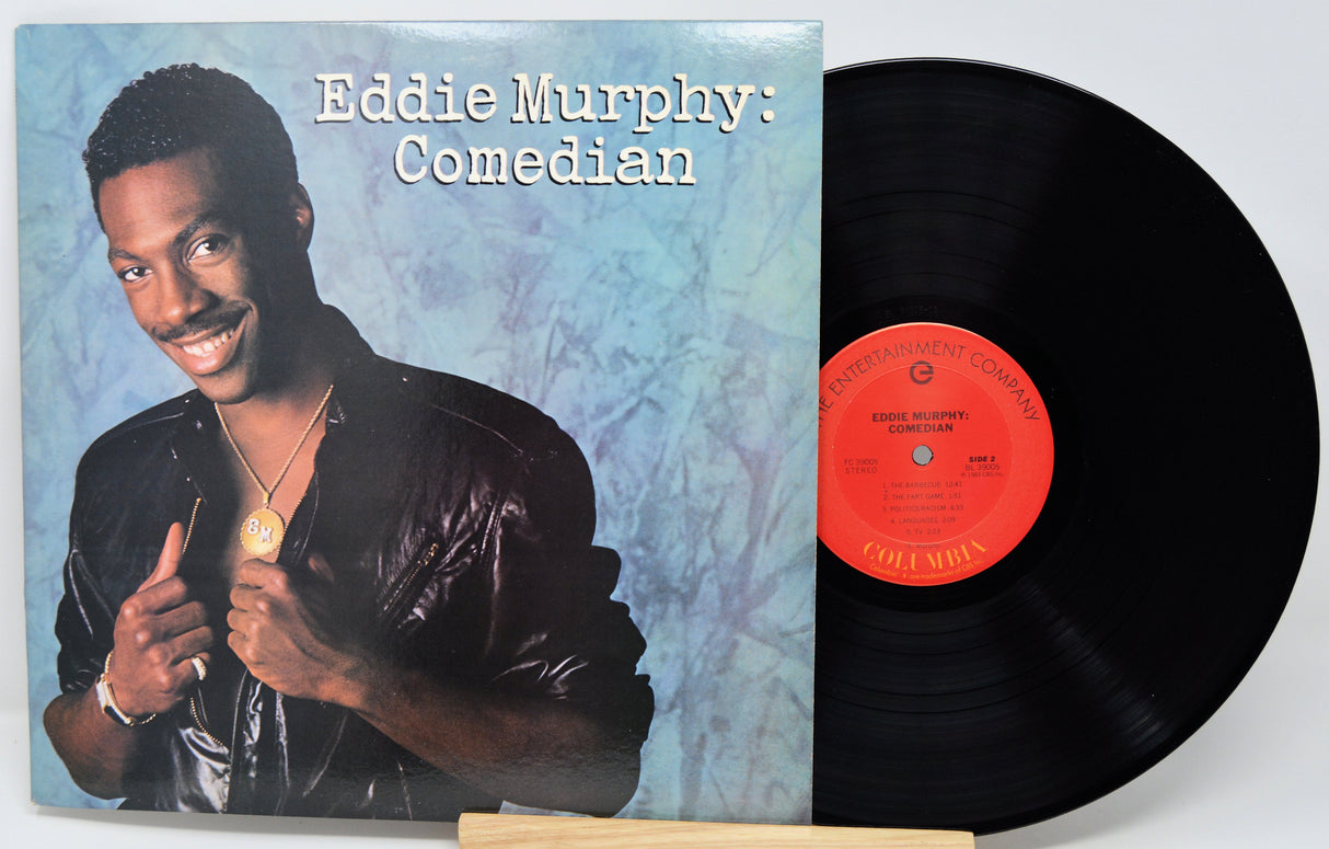 Vinyl record with cover featuring Eddie Murphy, labeled 'Eddie Murphy: Comedian'.