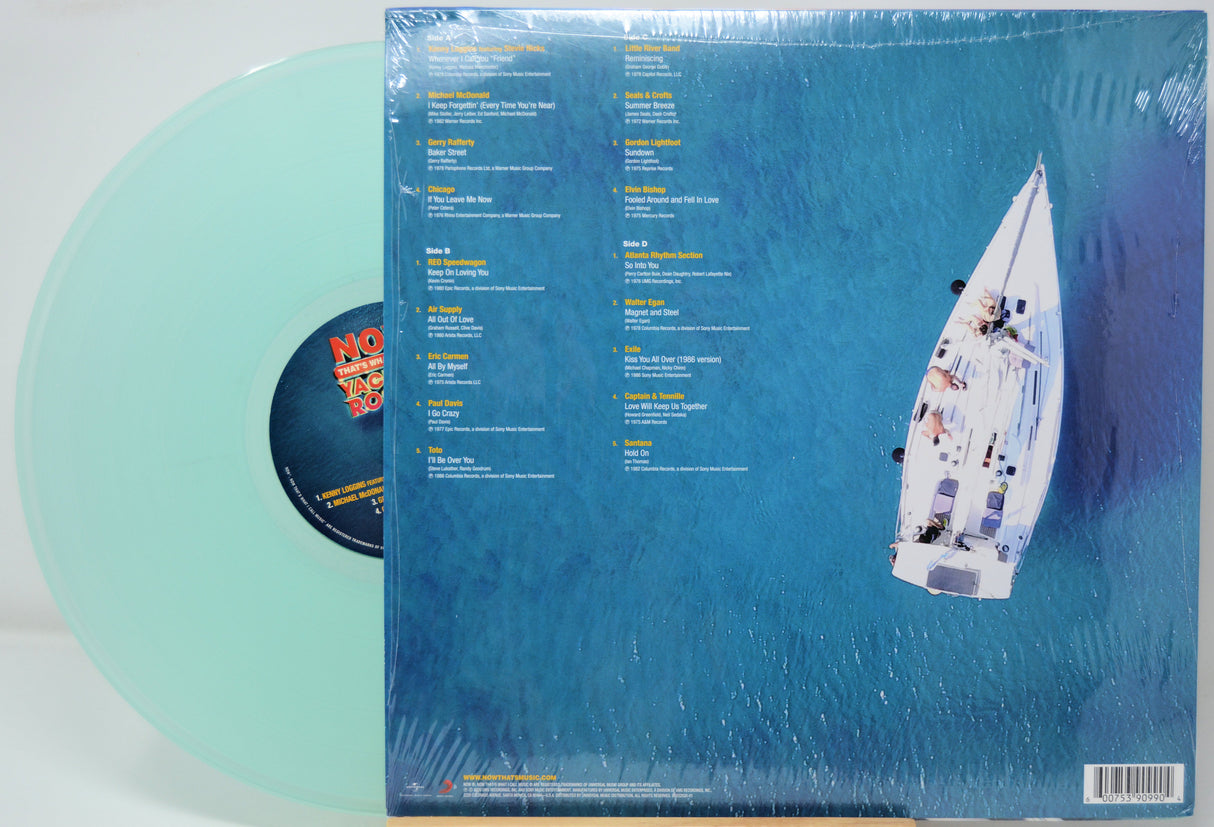 Vinyl record with a sailboat illustration and song listing on the back cover