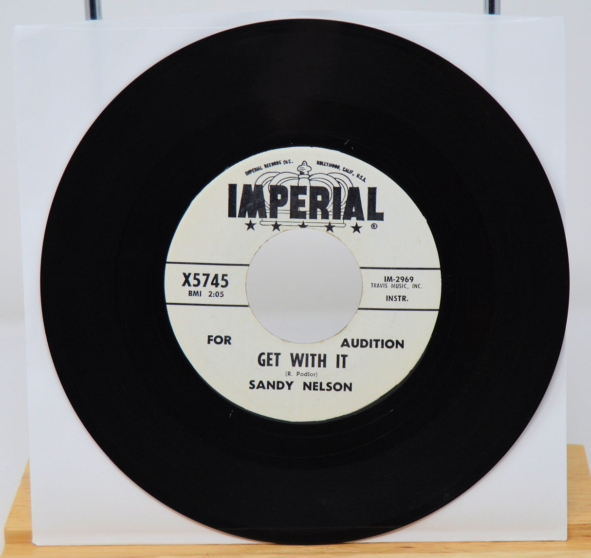 Vinyl record with Imperial label on a white background