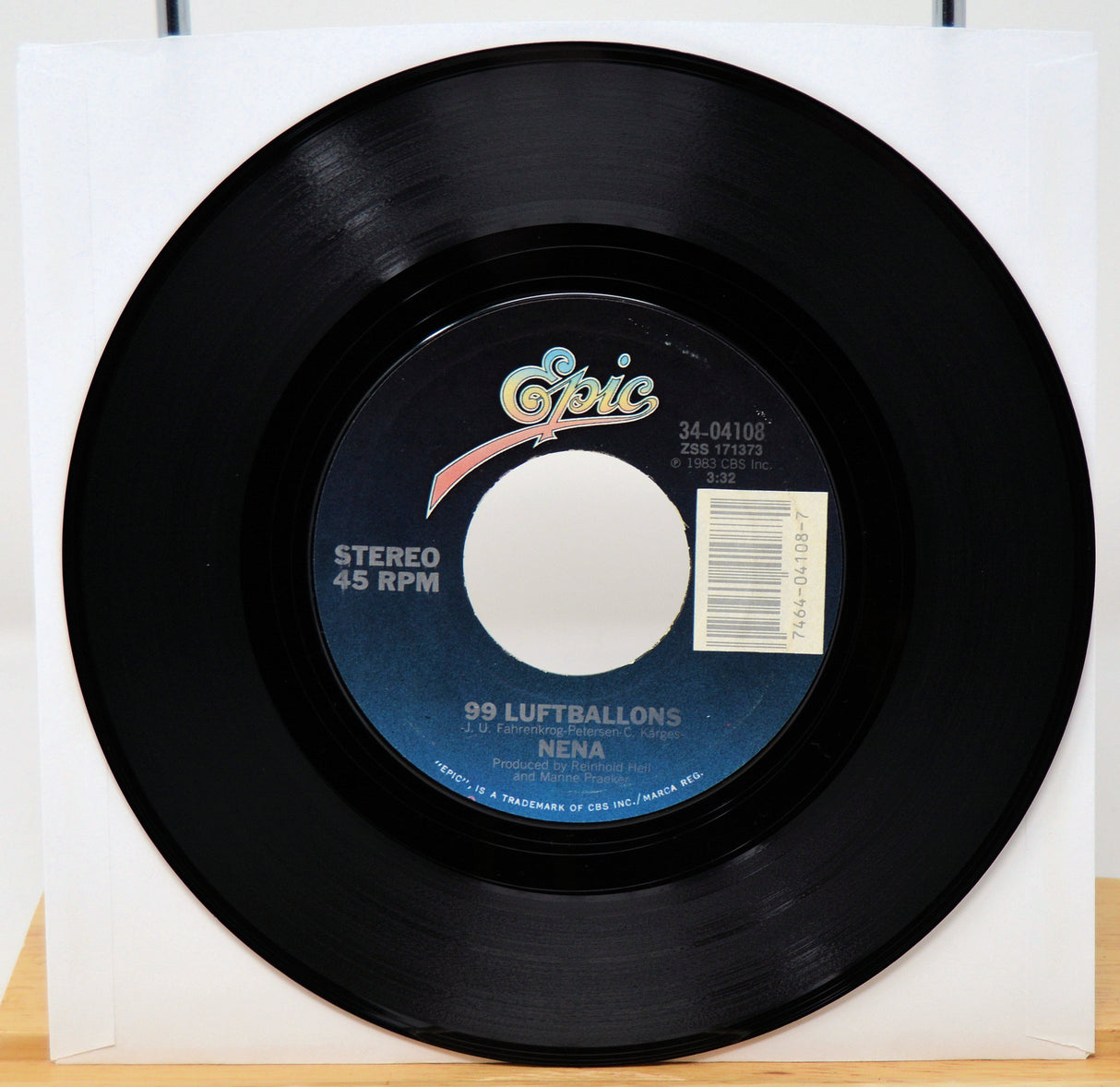Vinyl record with a blue label featuring the word 'Epic' on a white background
