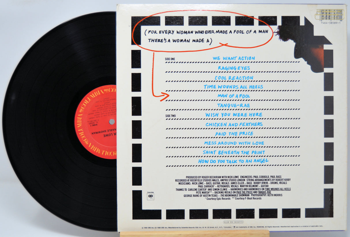 'Nick Lowe Abominable Snowman' Vinyl record with a detailed cover featuring text and graphics.