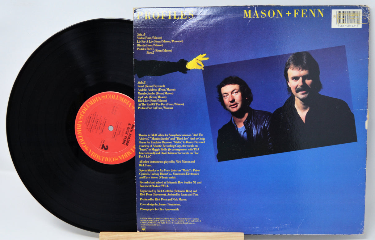 Vinyl record with cover featuring two men and text