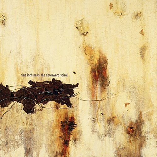 Abstract vinyl album cover for 'Downward Spiral' by Nine Inch Nails.