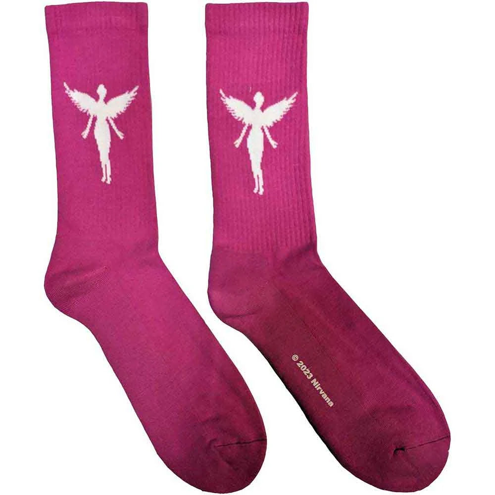Pink socks with white fairy design on a white background
