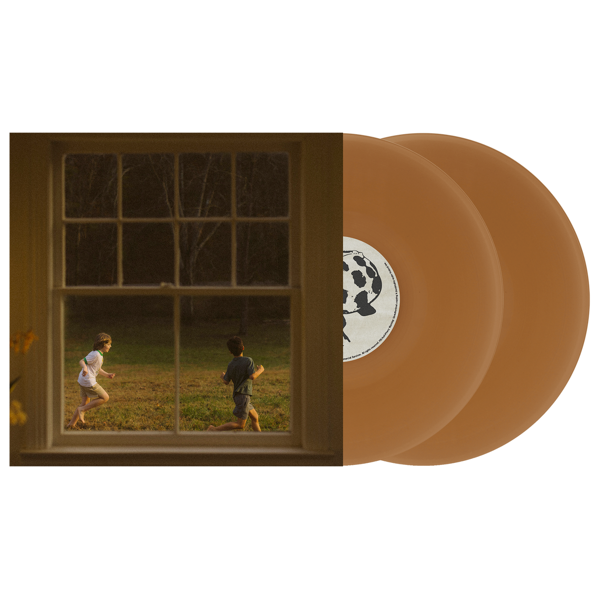 Vinyl records with a window view of two children playing outside.