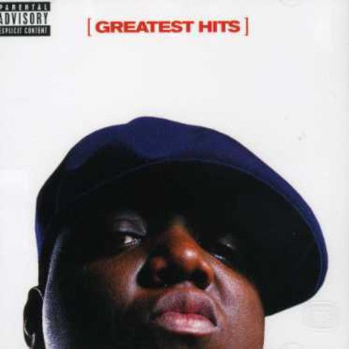 Album cover with a person wearing a blue cap and 'Greatest Hits' text.
