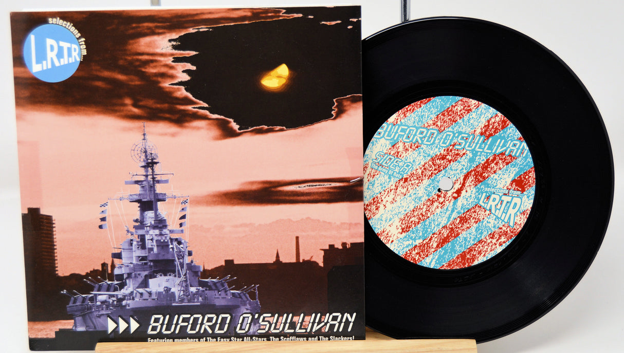 Vinyl record with cover featuring a ship and sunset, and a close-up of the record label.