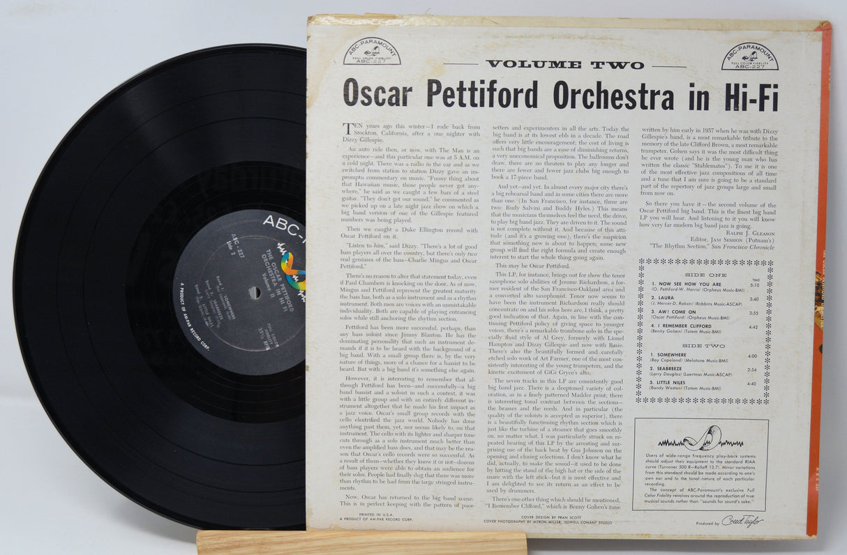 Back cover of Oscar Pettiford Orchestra in Hi-Fi Vol. 2 LP with detailed liner notes and exposed black vinyl record