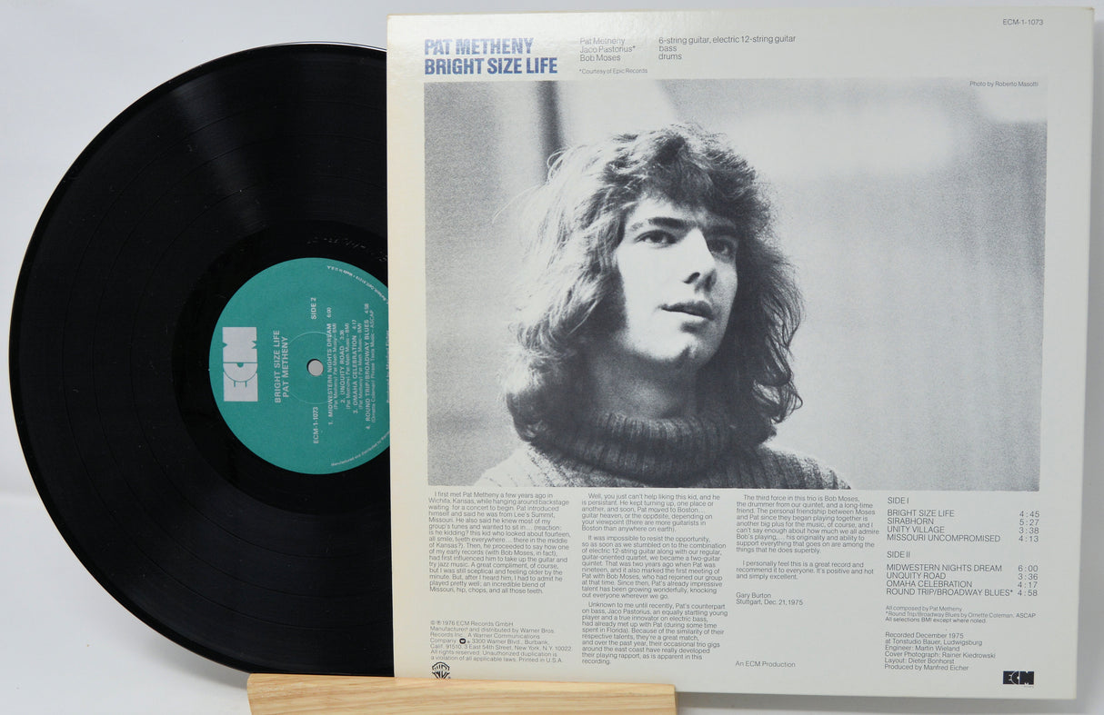 Vinyl record with a portrait on the cover and text details