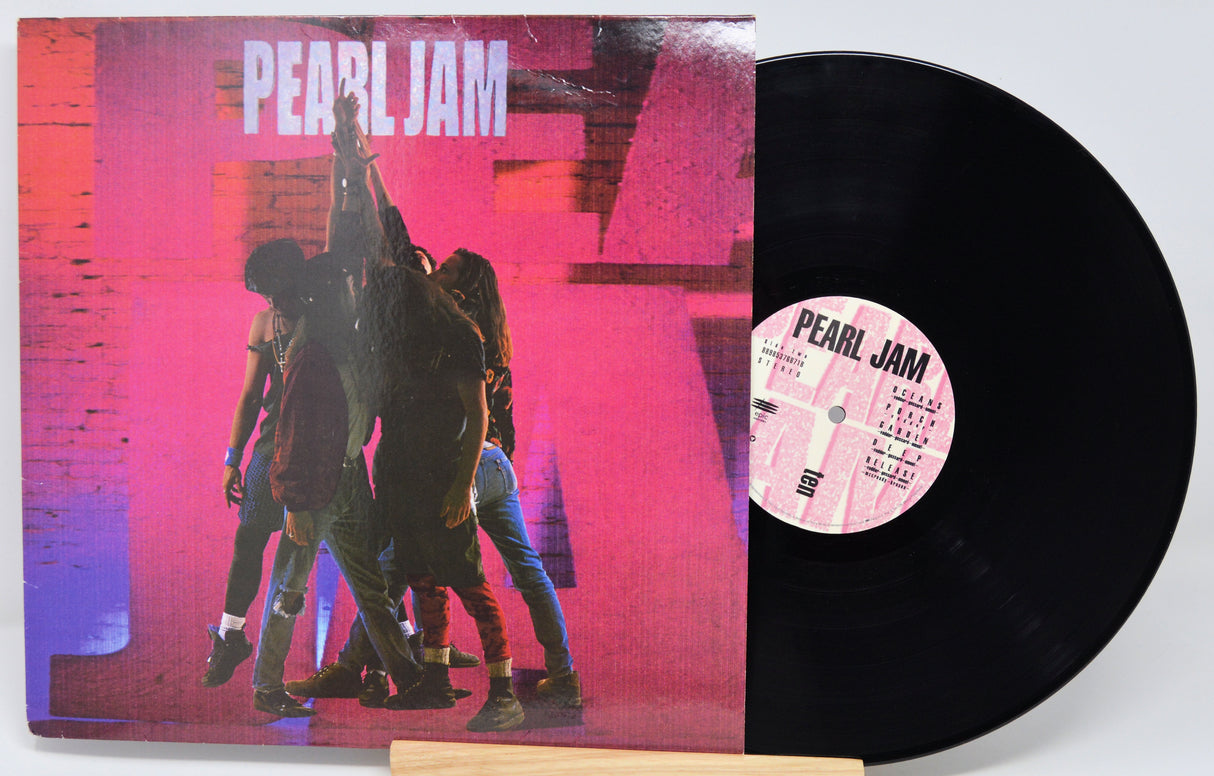 Vinyl record with 'Pearl Jam' album cover showing a horse and band members.