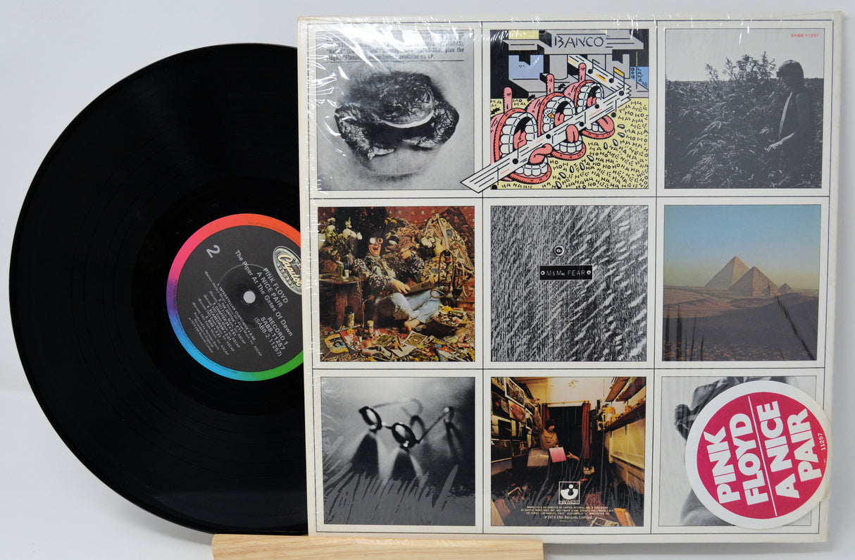Vinyl record with a cover displaying album artwork and 'Pink Floyd' branding.