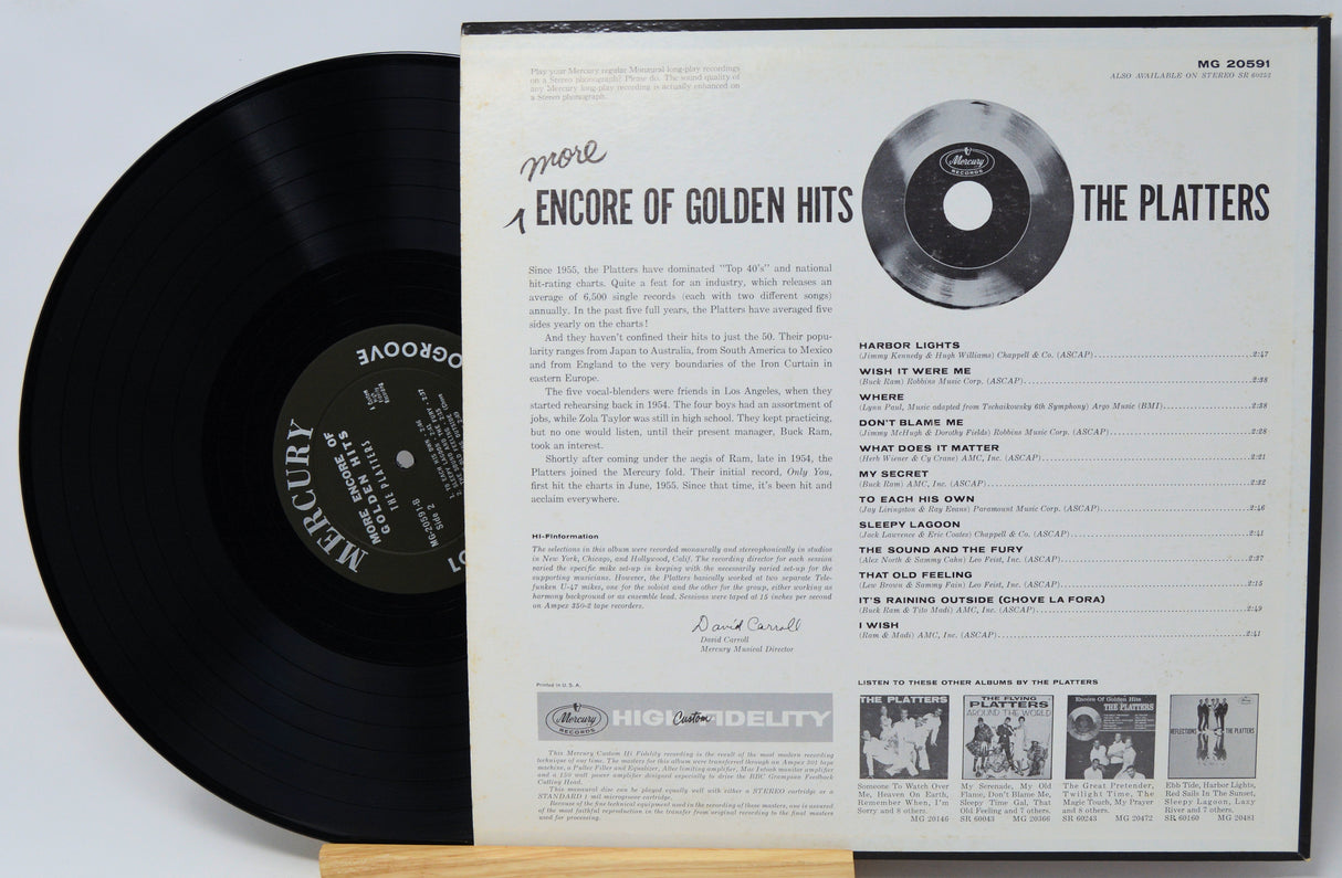 Vinyl record with its cover displaying text and a disc label.