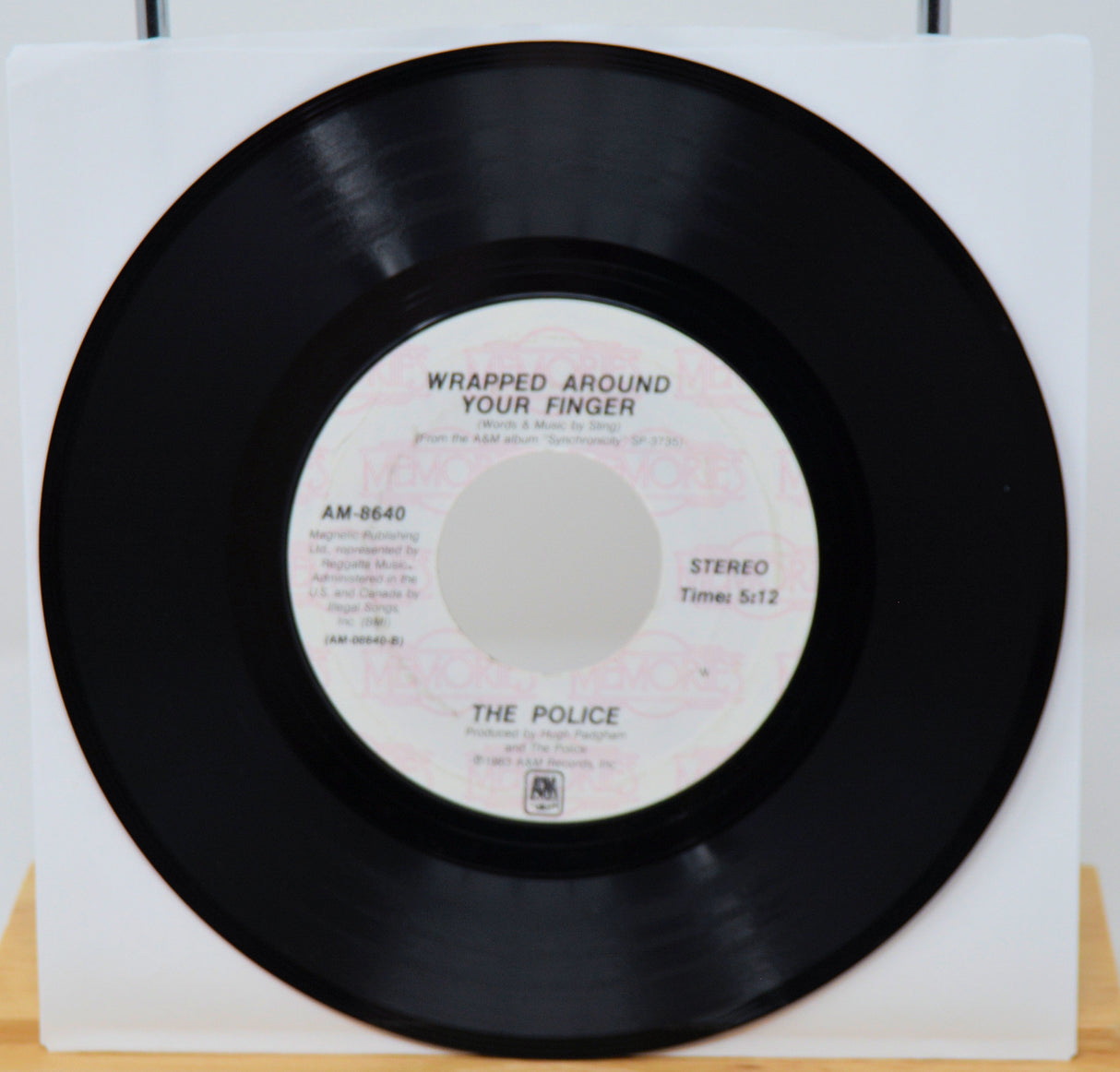 Vinyl record with cover displaying 'Mindrocker' on a white background