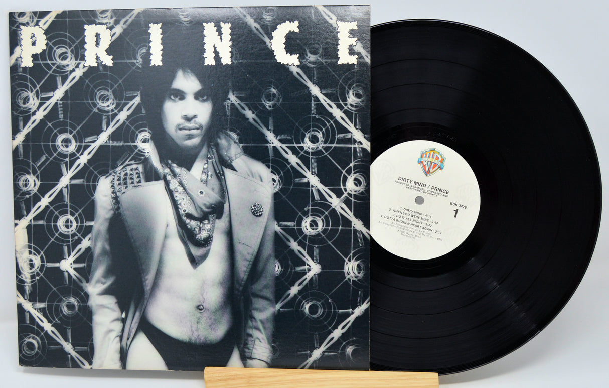 Vinyl record with a cover featuring a person and the word 'PRINCE'.