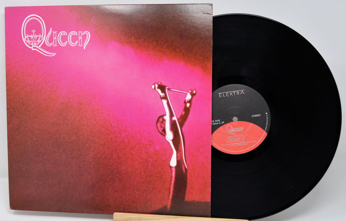 Vinyl record with blue cover featuring band members and 'Blues Theme' text.