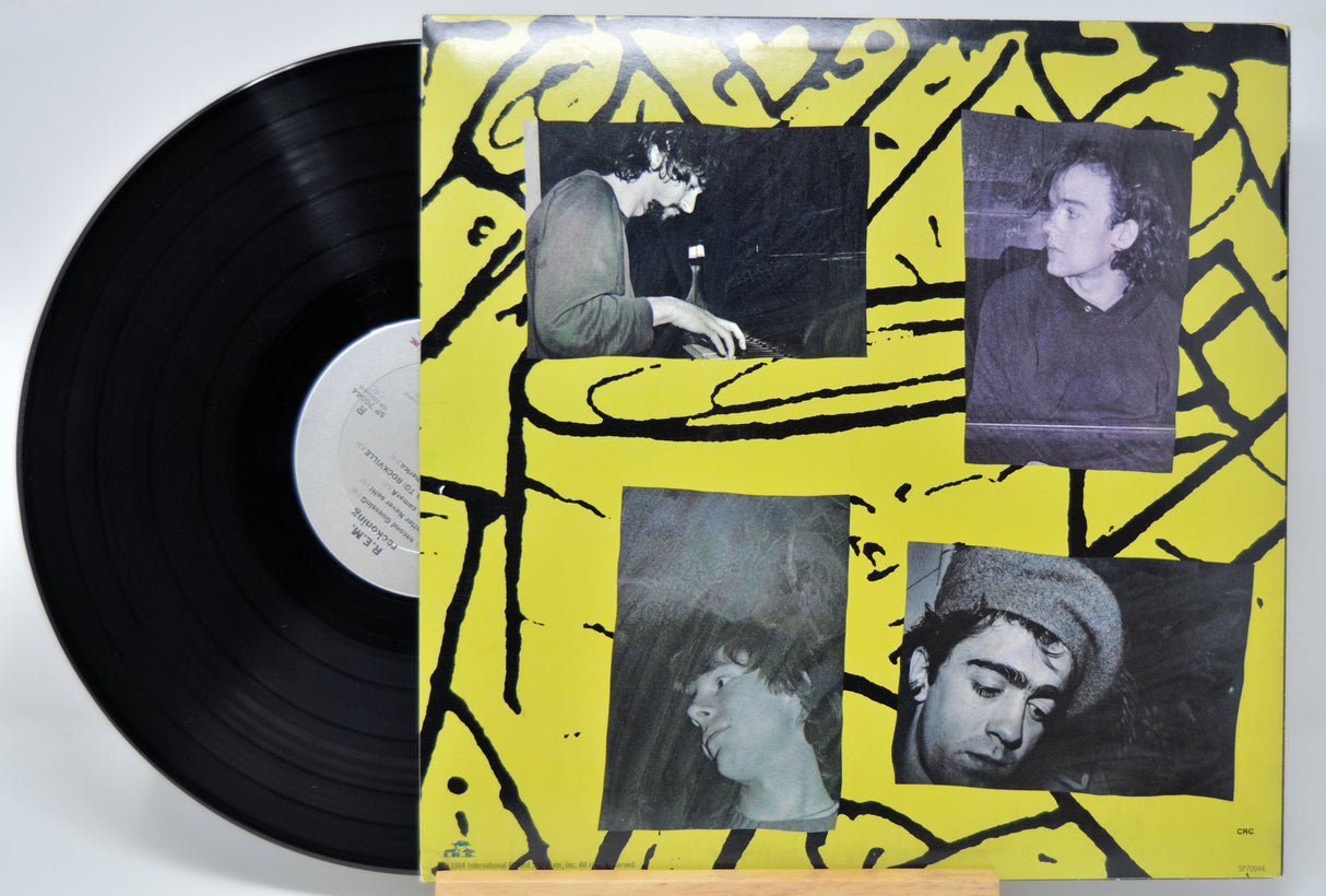 'R.E.M. Reckoning' Vinyl record with a yellow cover featuring black and white images of the band.