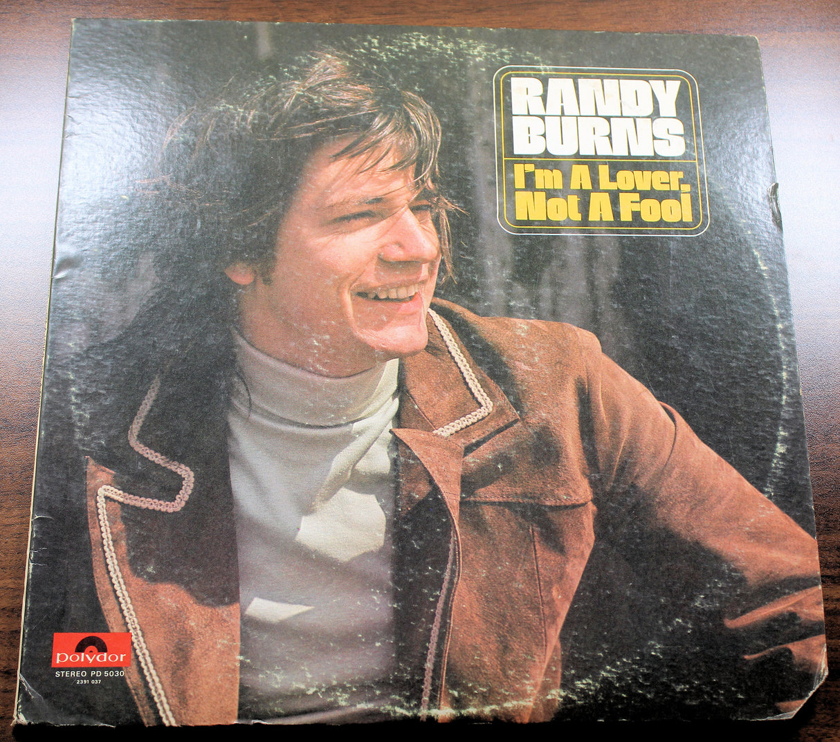 Front cover of Randy Burns' album 'I'm A Lover, Not A Fool' featuring the artist smiling