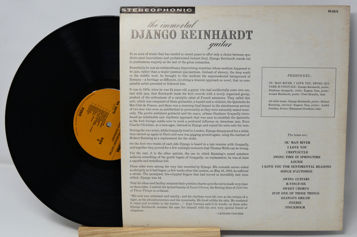 Vinyl record with its cover displaying text and a logo on a white background