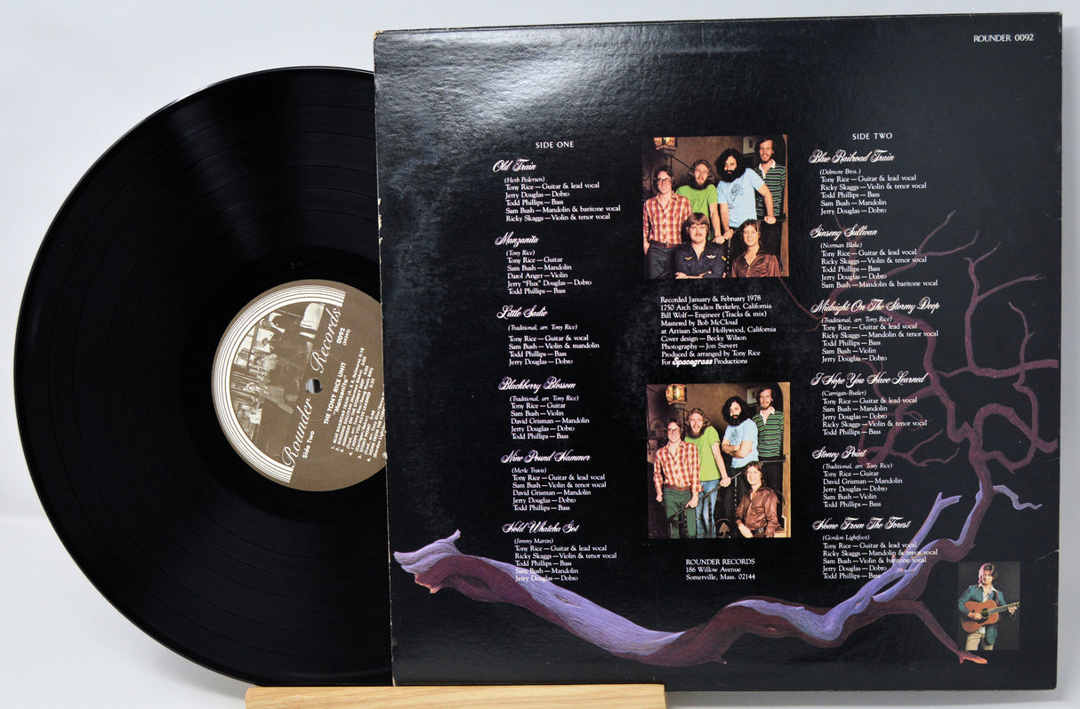 Vinyl record with a black cover featuring album artwork and track listings.