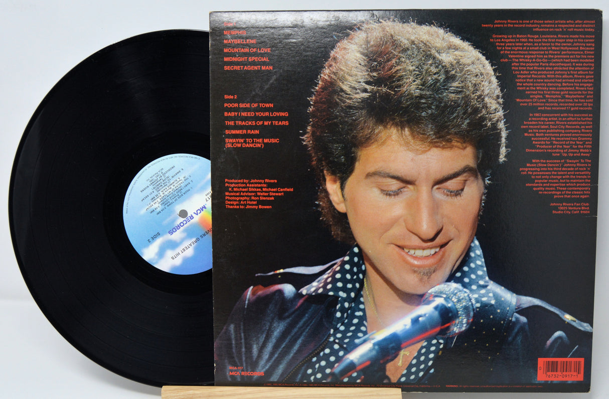 Vinyl record with a cover featuring a person singing into a microphone