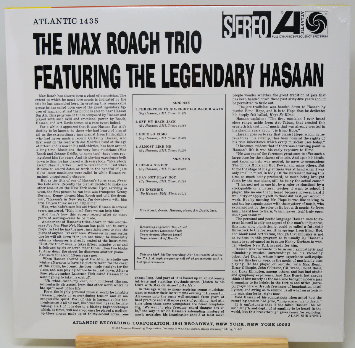 The back cover of a vinyl record sleeve for 'The Max Roach Trio Featuring the Legendary Hasaan' on Atlantic Records, showing tracklist text, biographical copy, and a 'Sereo 45' logo.