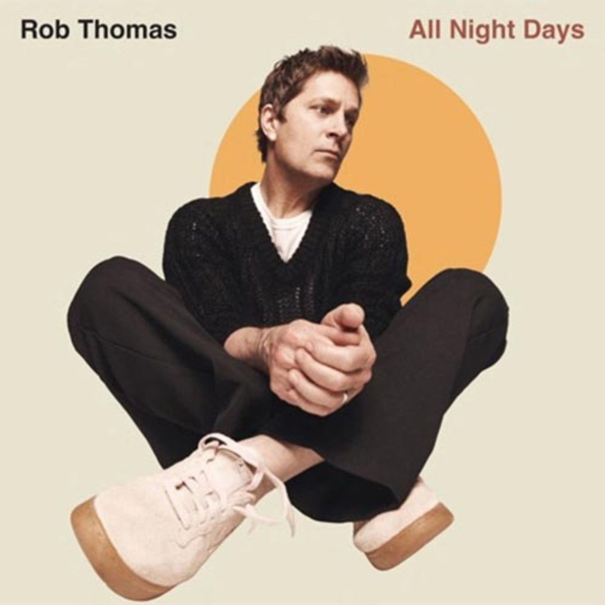 Rob Thomas All Night Days album cover showing the artist seated in front of an orange circle