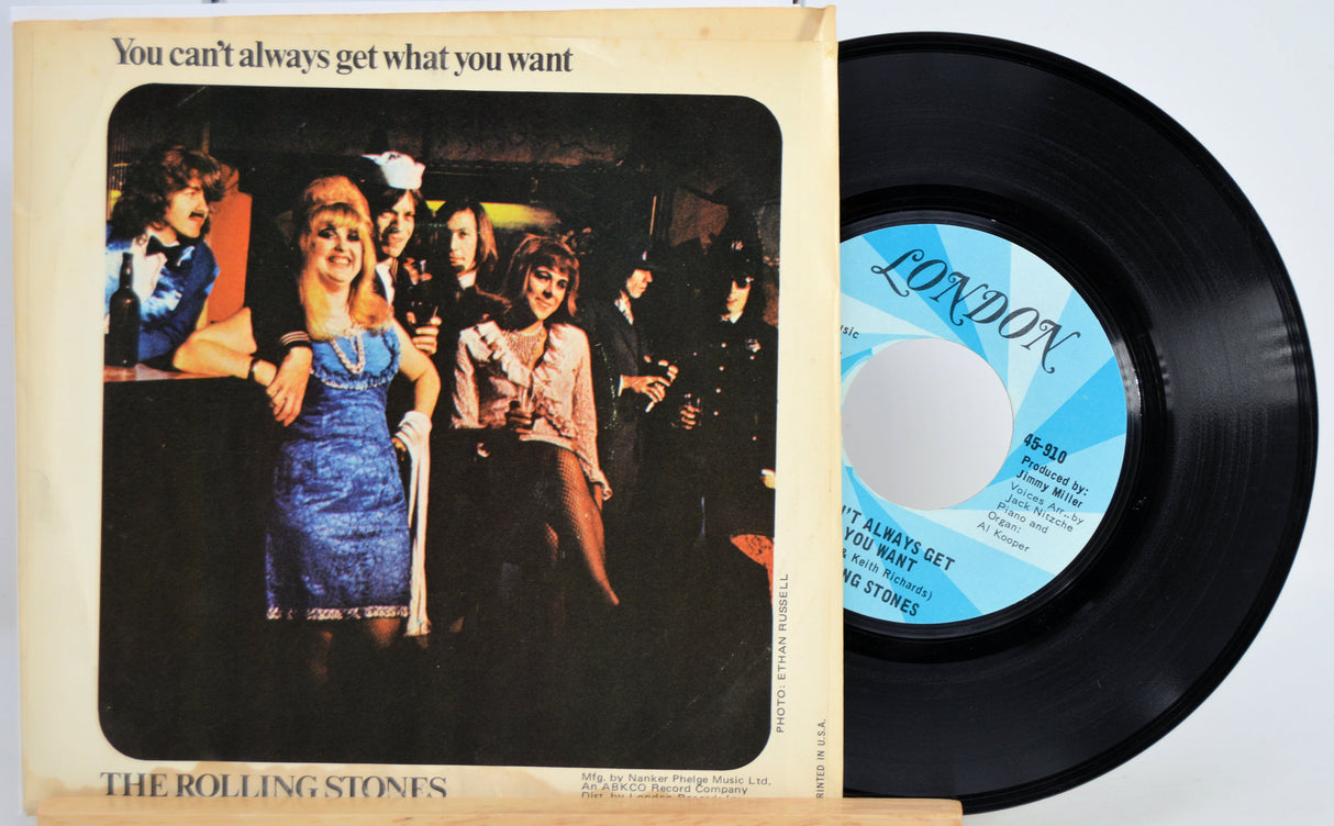 Vinyl record with cover featuring The Rolling Stones and text 'You can't always get what you want'.