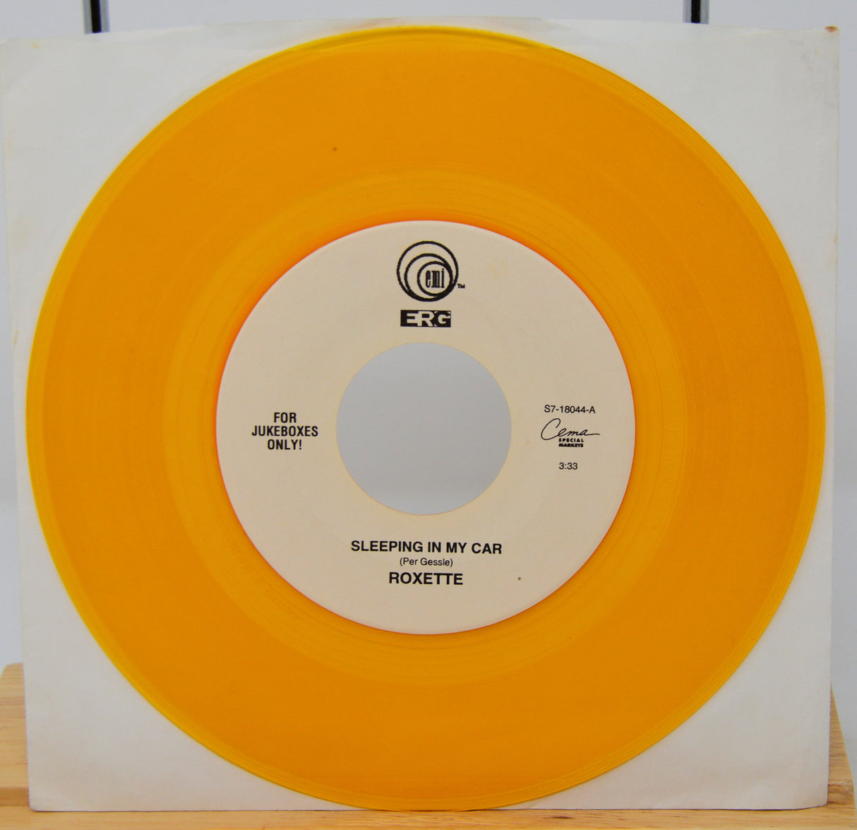 Vinyl record with orange outer sleeve and white inner label displaying 'Roxette' and 'Erg' branding.