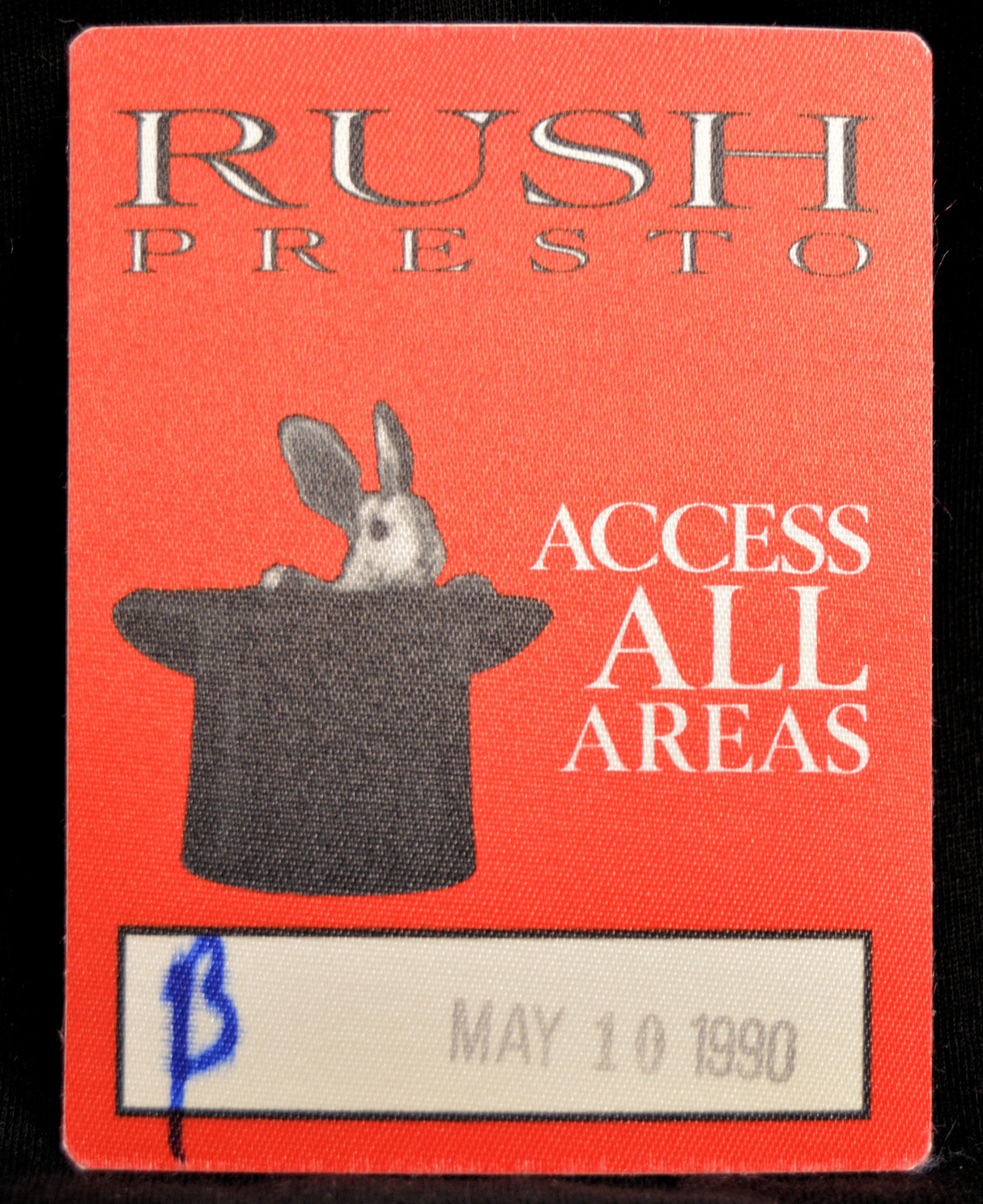 Red backstage pass with 'Rush Presto' branding, rabbit in a hat illustration, and text 'Access All Areas' on an orange red.