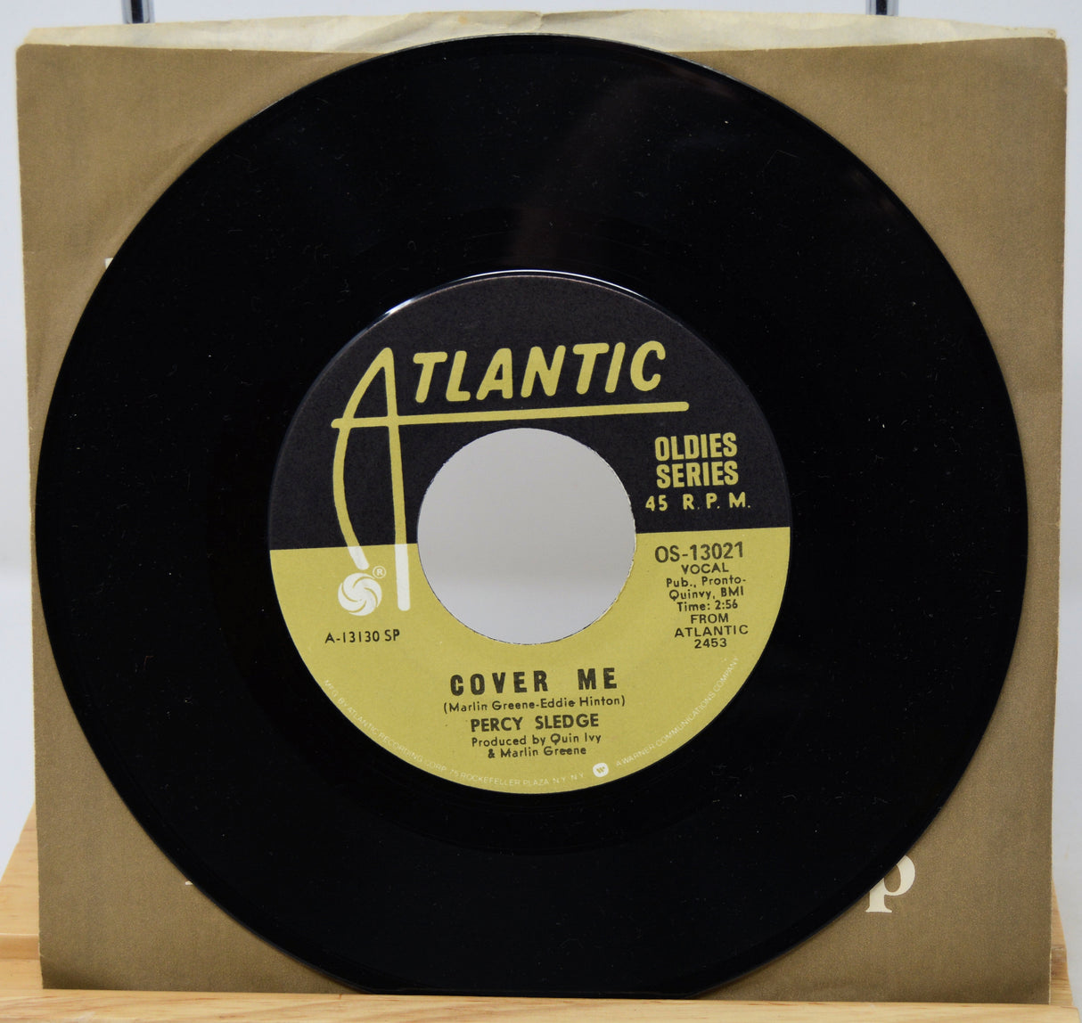 45 RPM record with Atlantic label on a cardboard backing