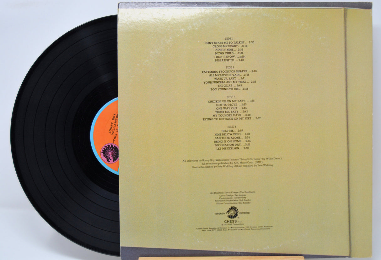 Vinyl record 'Sonny Boy Williamson This Is My Story' with a orange label showing track listings on a white background