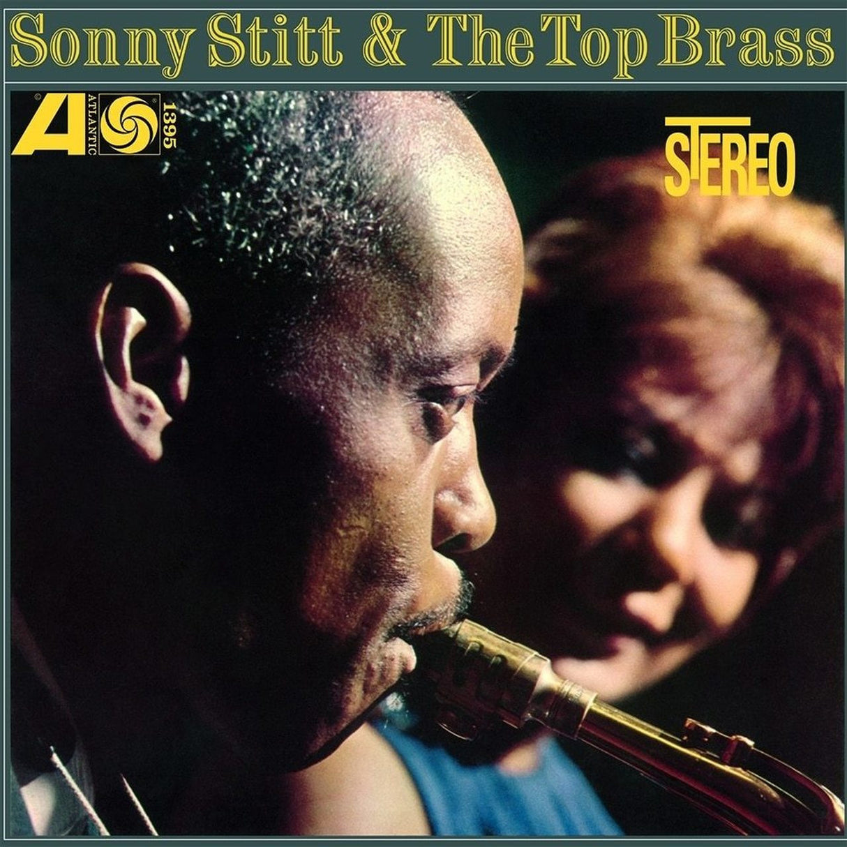 Album cover for 'Sonny Stitt & The Top Brass' featuring a close-up photo of Sonny Stitt playing a brass instrument, with a blurred figure in the background and yellow title text at the top.
