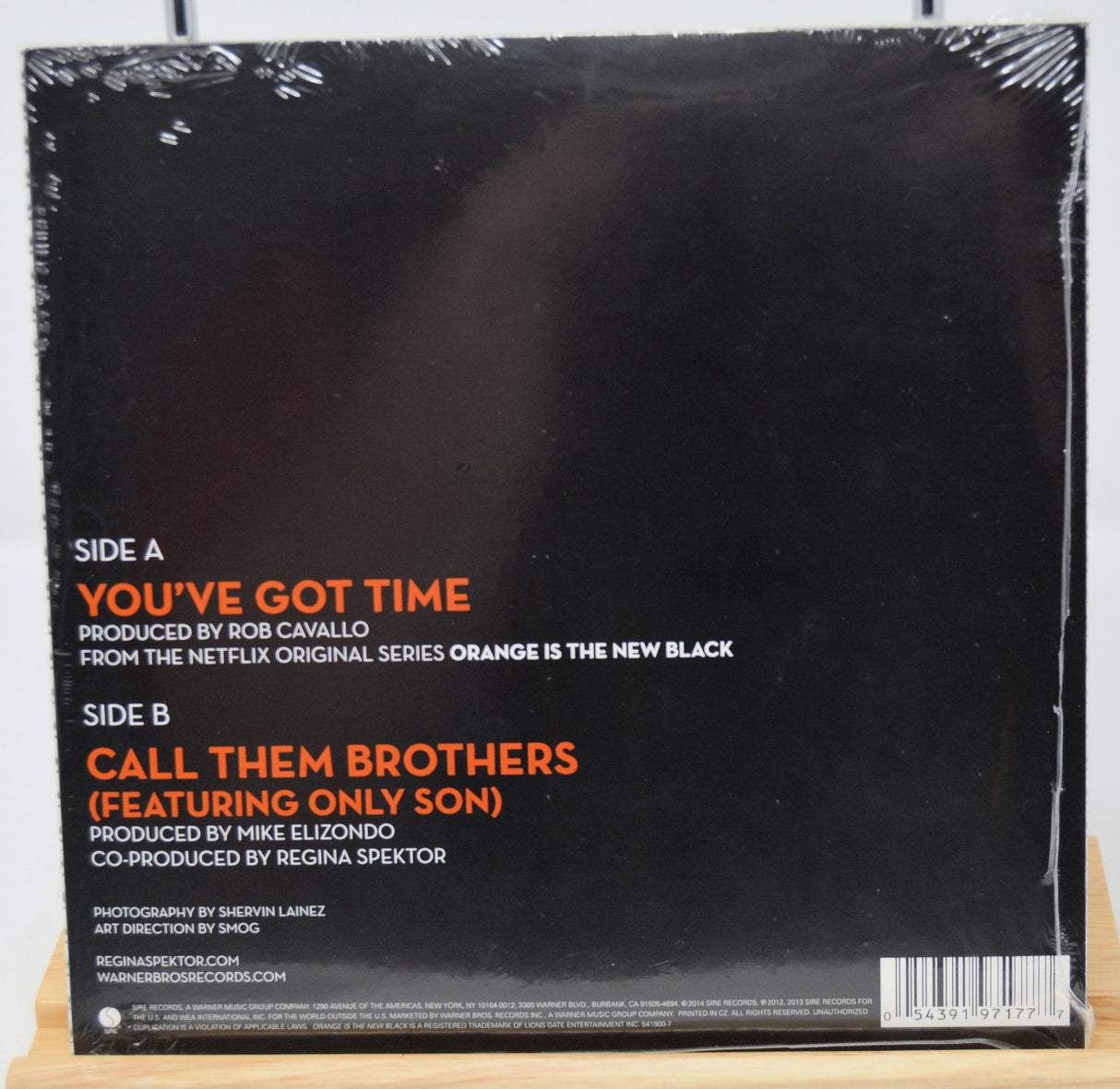Vinyl record sleeve with text on a white background