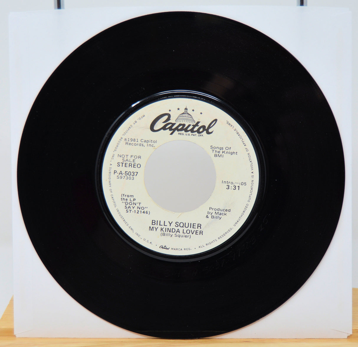 Vinyl record with Capitol label on a white background