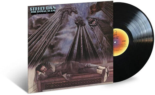 Vinyl record of Steely Dan album 'The Royal Scam' featuring a cover with a figure lying down with a guitar, and a bird perched on a cage.