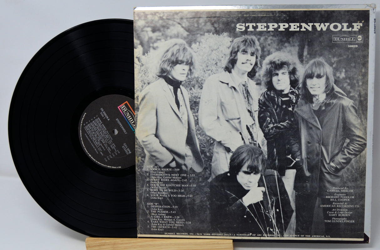 Vinyl record with Steppenwolf album cover featuring band members outdoors.